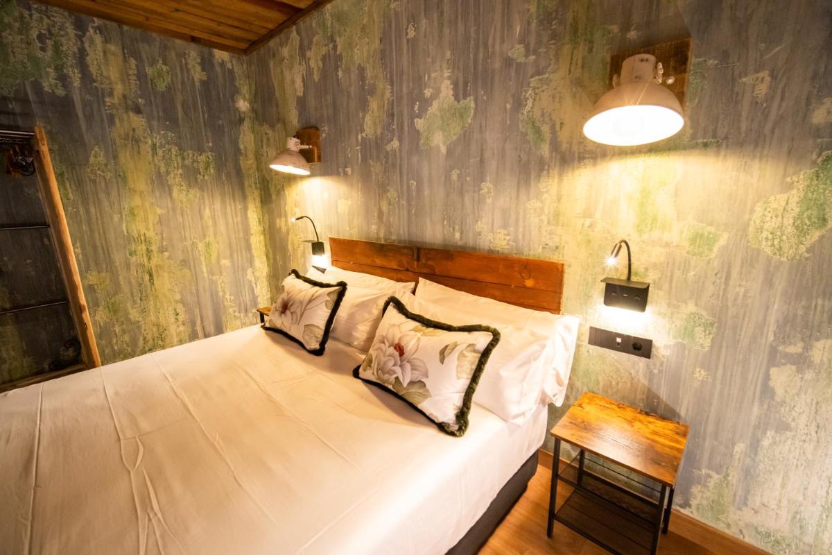 Cama o camas de una habitación en HOTEL SOMNIFABRIK