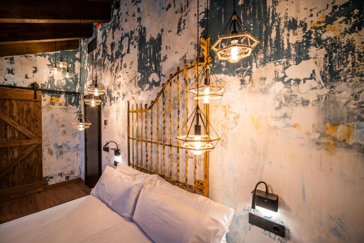 Cama o camas de una habitación en HOTEL SOMNIFABRIK