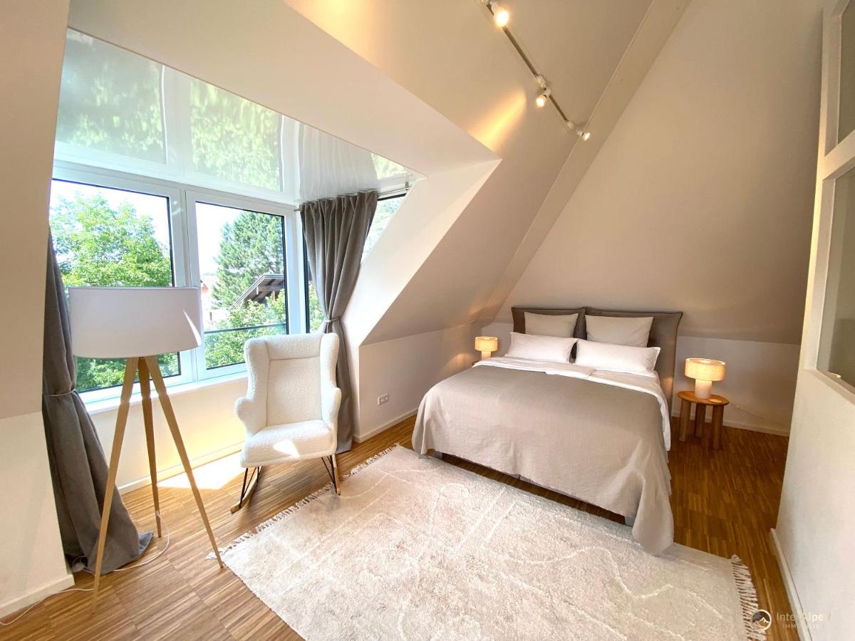 Suitetrails - Cinema House - Ferienhaus im Natural Living Look mit Heimkino und Südterrasse - 136 qm
