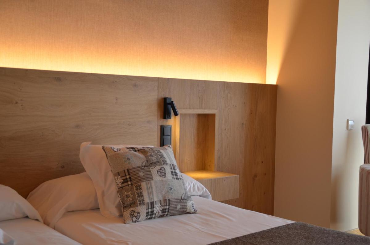 Cama o camas de una habitación en Hotel La Morera