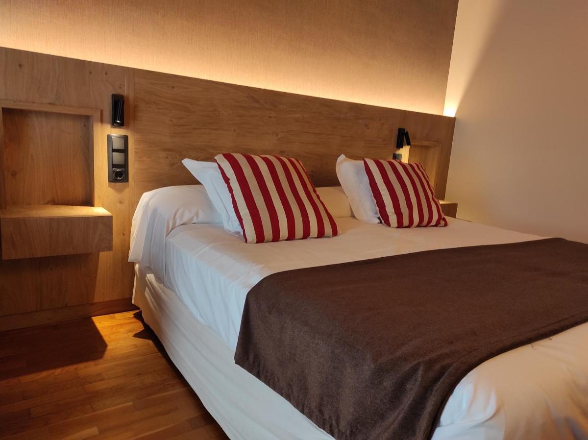 Cama o camas de una habitación en Hotel La Morera