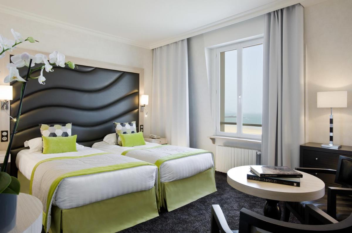 Un ou plusieurs lits dans un hébergement de l'établissement Grand Hôtel Des Thermes