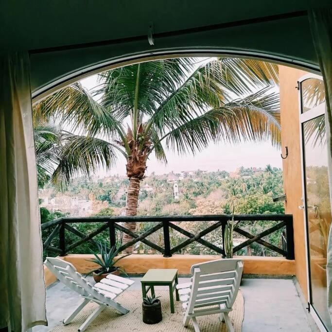 Casa Rogelia lugar tranquilo con vista al mar. - Housity