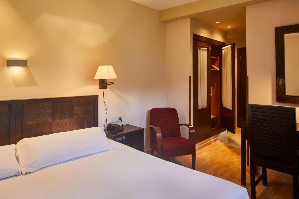 Cama o camas de una habitación en Silken Ordesa