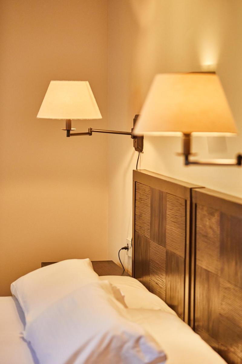 Cama o camas de una habitación en Silken Ordesa