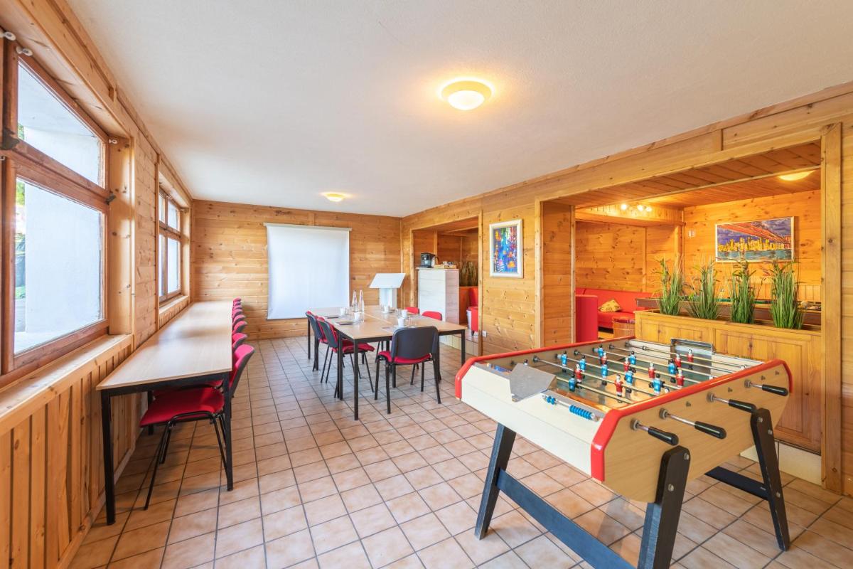 Salle de jeux dans l'établissement Hotel Le Bois Joli