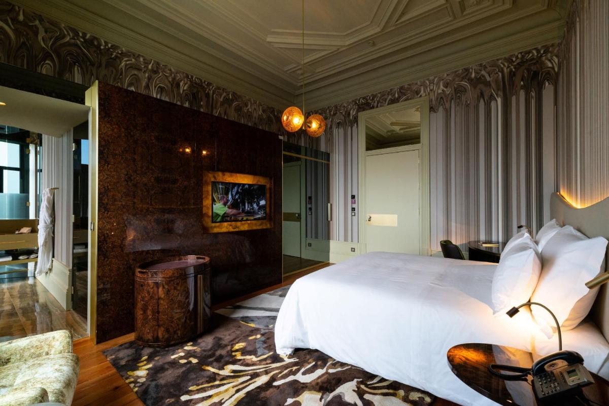 Uma cama ou camas num quarto em Vila Foz Hotel & SPA - member of Design Hotels