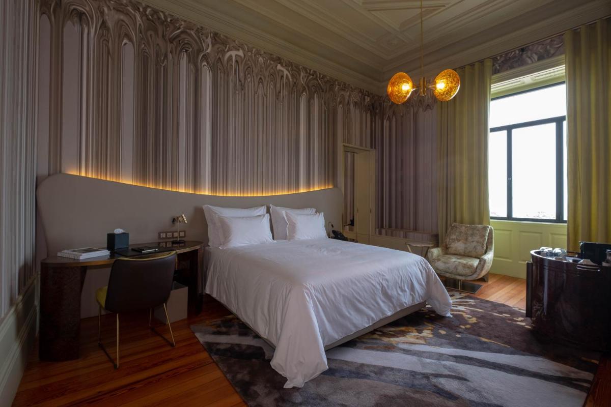 Uma cama ou camas num quarto em Vila Foz Hotel & SPA - member of Design Hotels