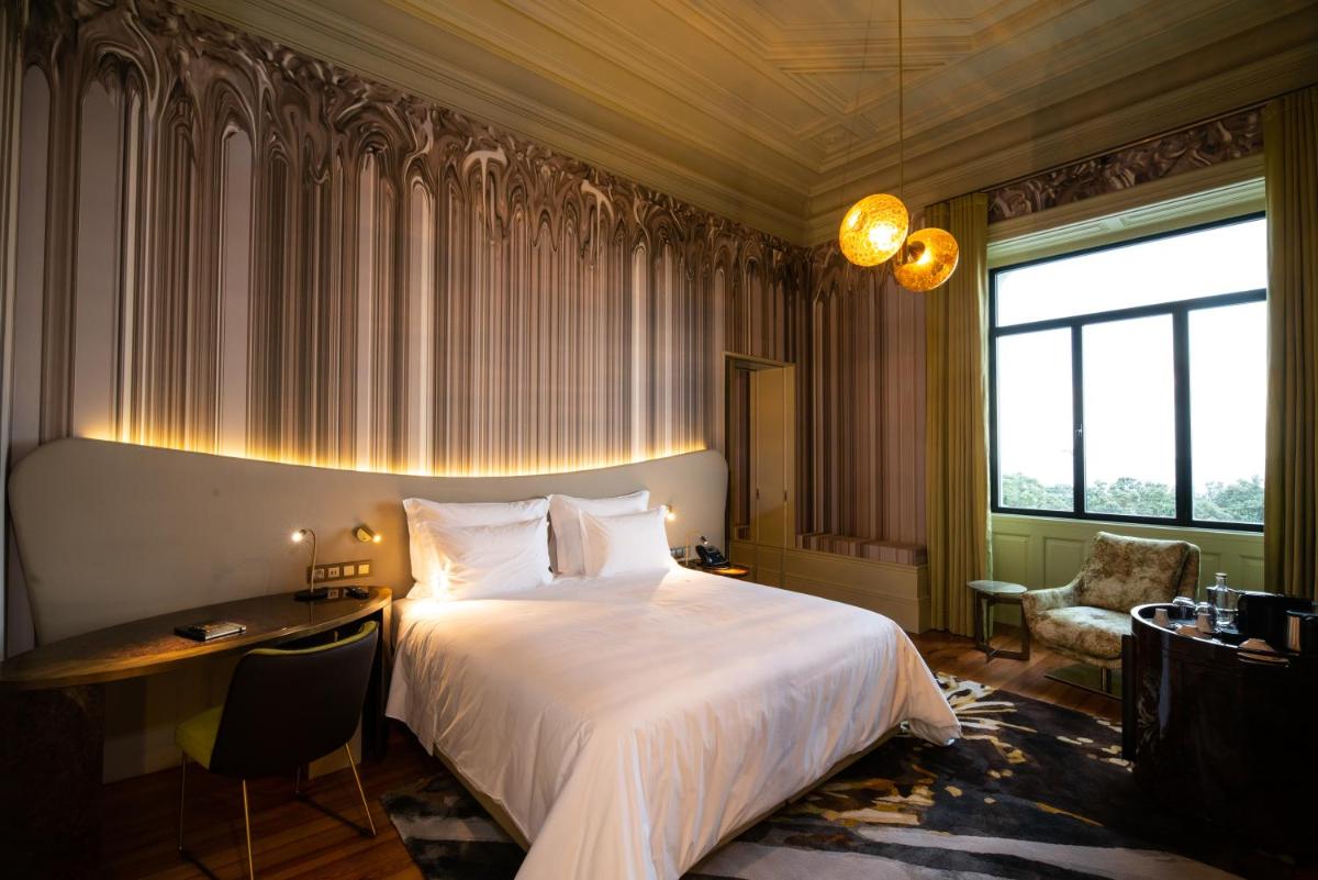 Uma cama ou camas num quarto em Vila Foz Hotel & SPA - member of Design Hotels
