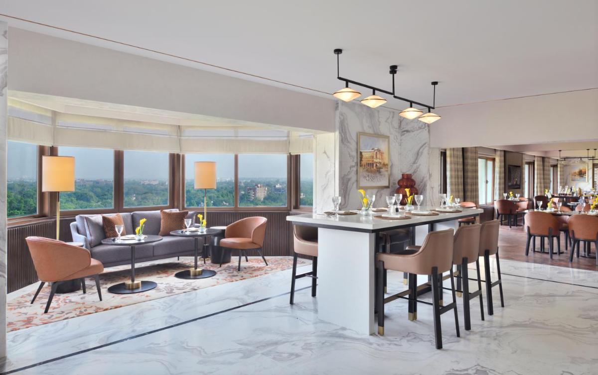 a rendering of a restaurant with a bar and chairs at Taj Mahal, New Delhi in New Delhi