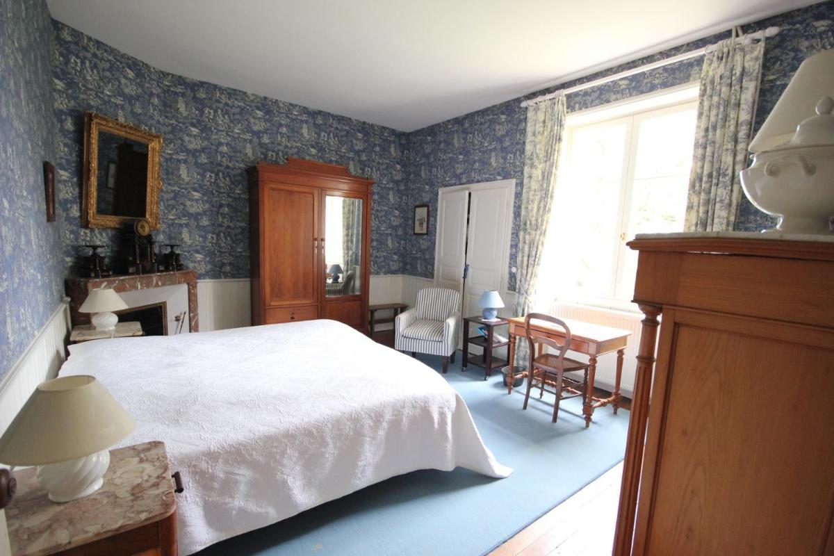Un ou plusieurs lits dans un hébergement de l'établissement Le Domaine de Mestré, The Originals Relais