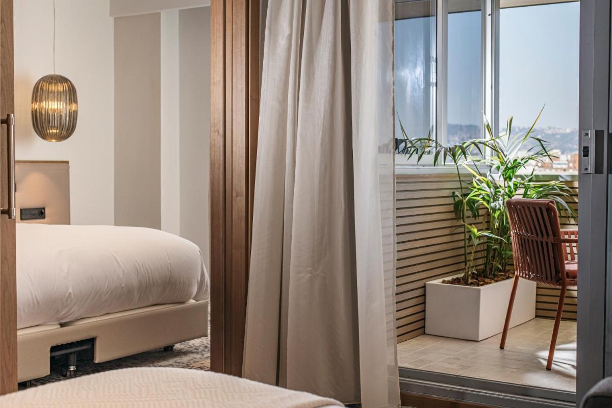 Cama o camas de una habitación en InterContinental Barcelona by IHG