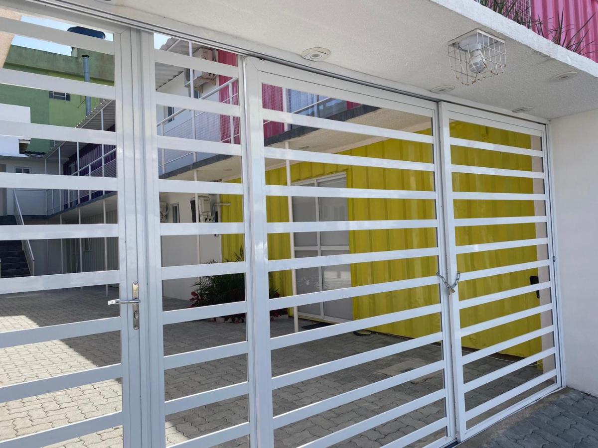 Loft container central c/ estacionamento - Housity