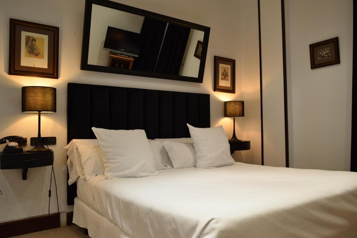 Cama o camas de una habitación en Hotel & Spa Arzuaga