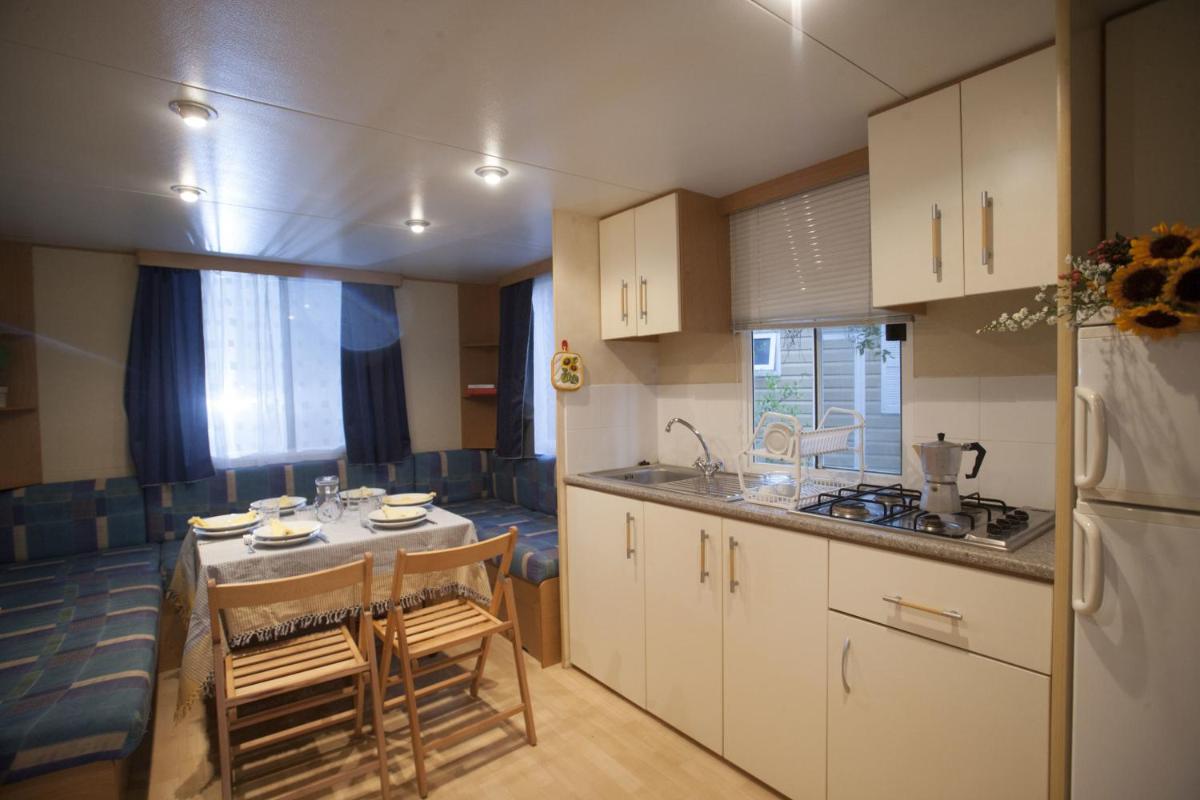 PuntAla Camp & Resort - Housity