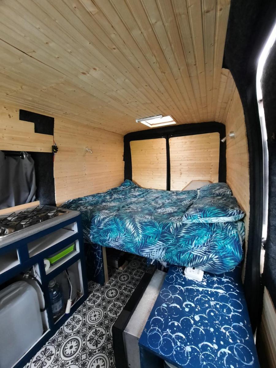 Double bed in a campervan - Housity