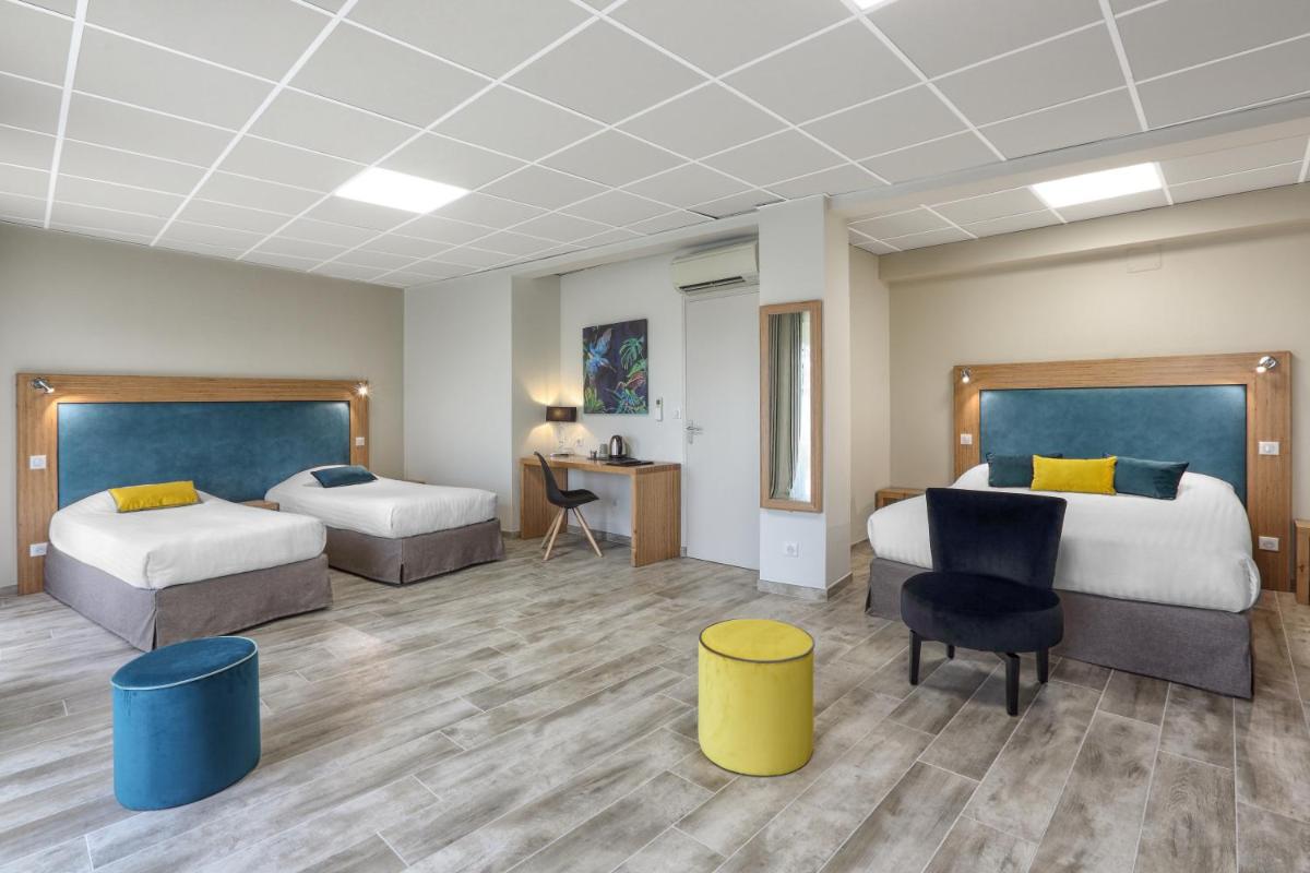 Un ou plusieurs lits dans un hébergement de l'établissement Hotel Restaurant Laborderie