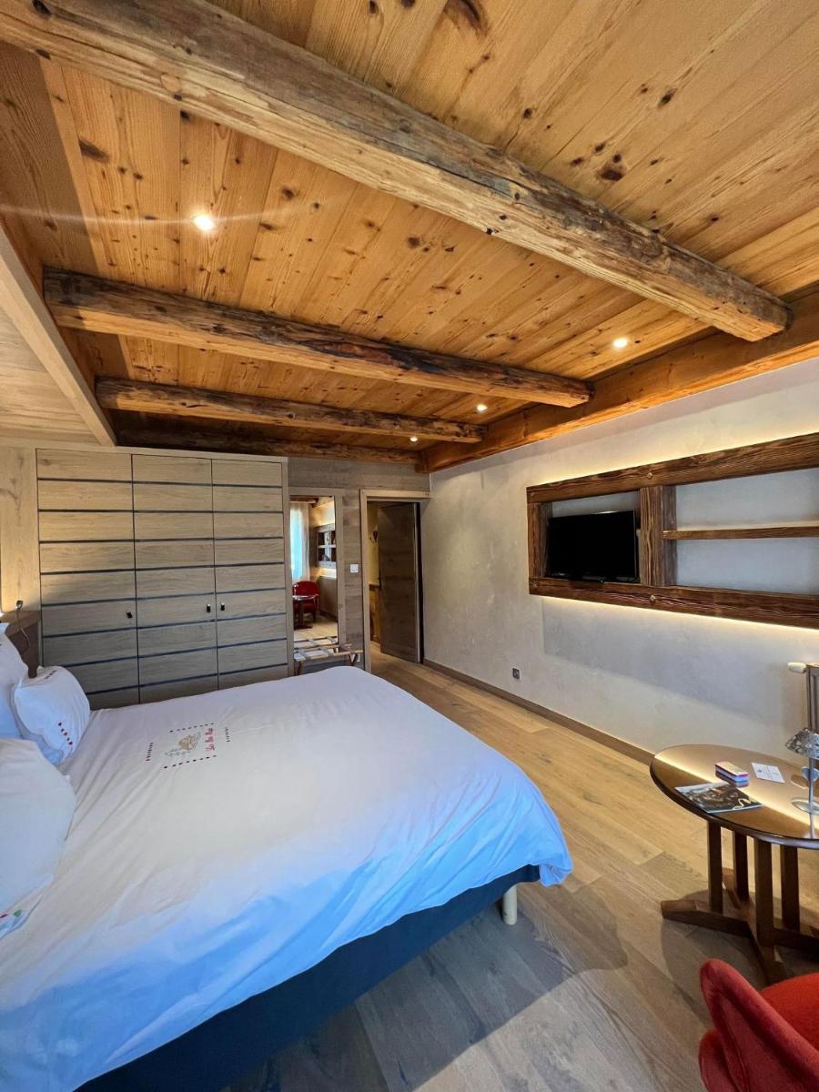 Un ou plusieurs lits dans un hébergement de l'établissement Hôtel-Restaurant Les Bas-Rupts, Singuliers Hôtel