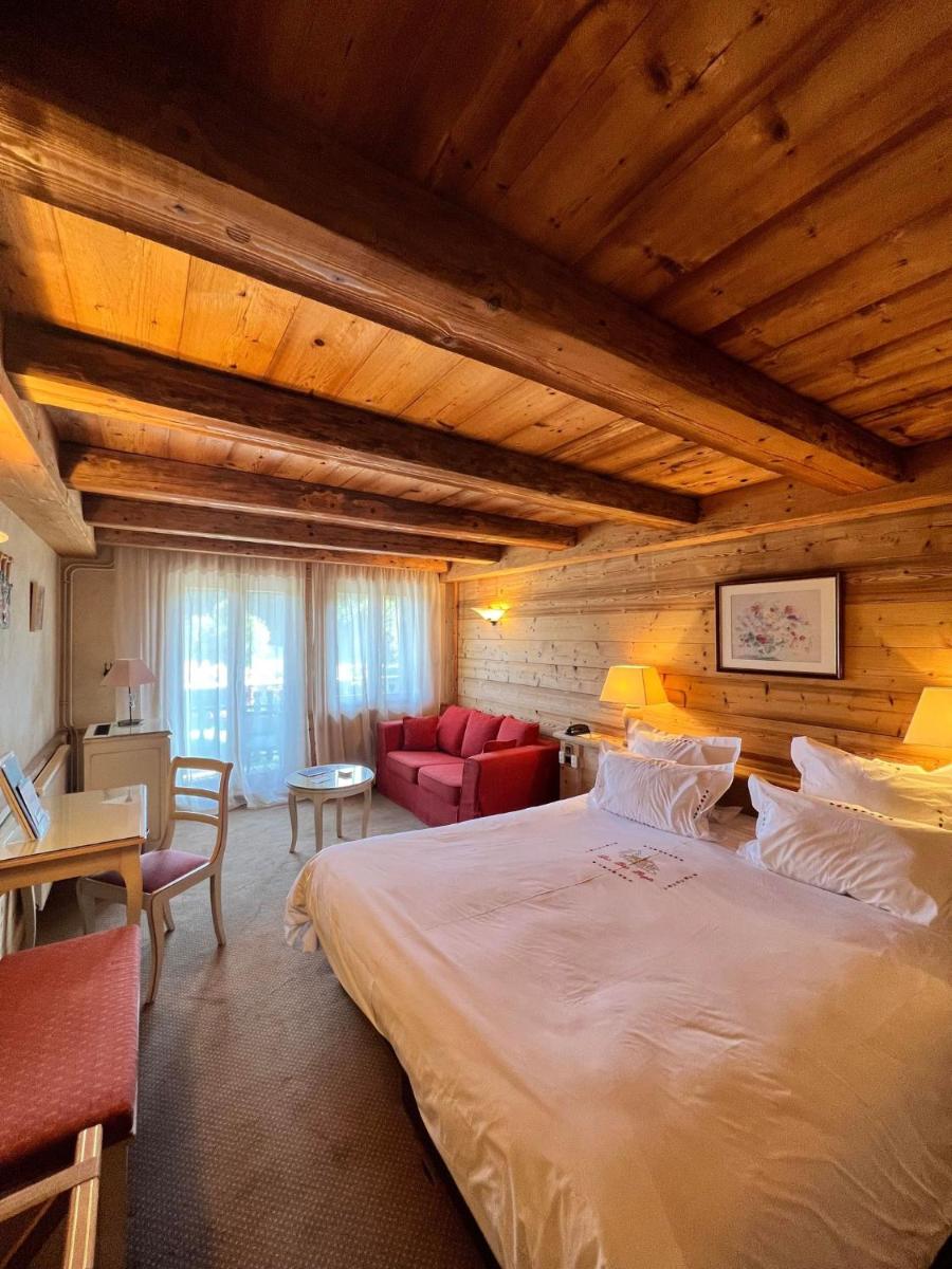 Un ou plusieurs lits dans un hébergement de l'établissement Hôtel-Restaurant Les Bas-Rupts, Singuliers Hôtel
