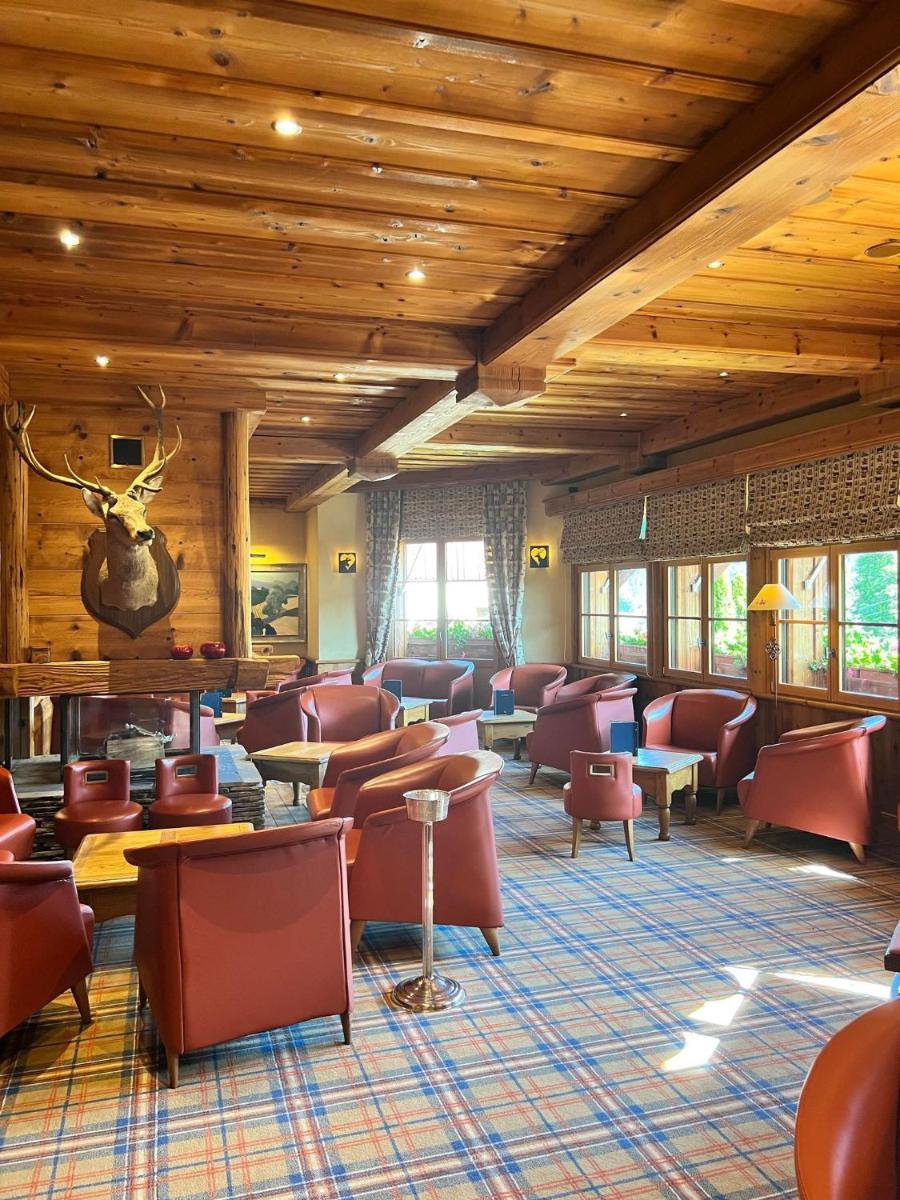 Coin salon dans l'établissement Hôtel-Restaurant Les Bas-Rupts, Singuliers Hôtel