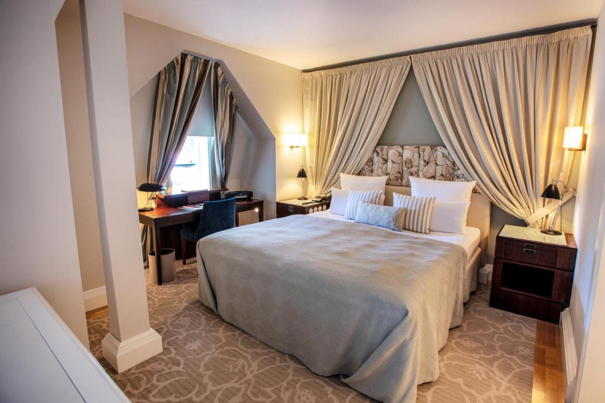 Ein Bett oder Betten in einem Zimmer der Unterkunft Weissenhaus Private Nature Luxury Resort