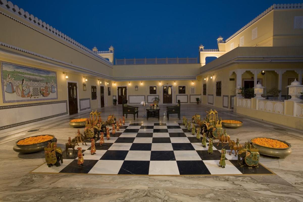 a large room with a chess board in a building at The Raj Palace (Small Luxury Hotels of the World) in Jaipur