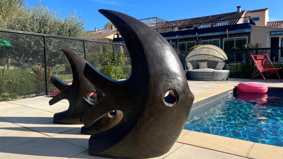 Piscine de l'établissement Logis Hôtel & Spa Déjeunez Sous L'Arbre ou située à proximité