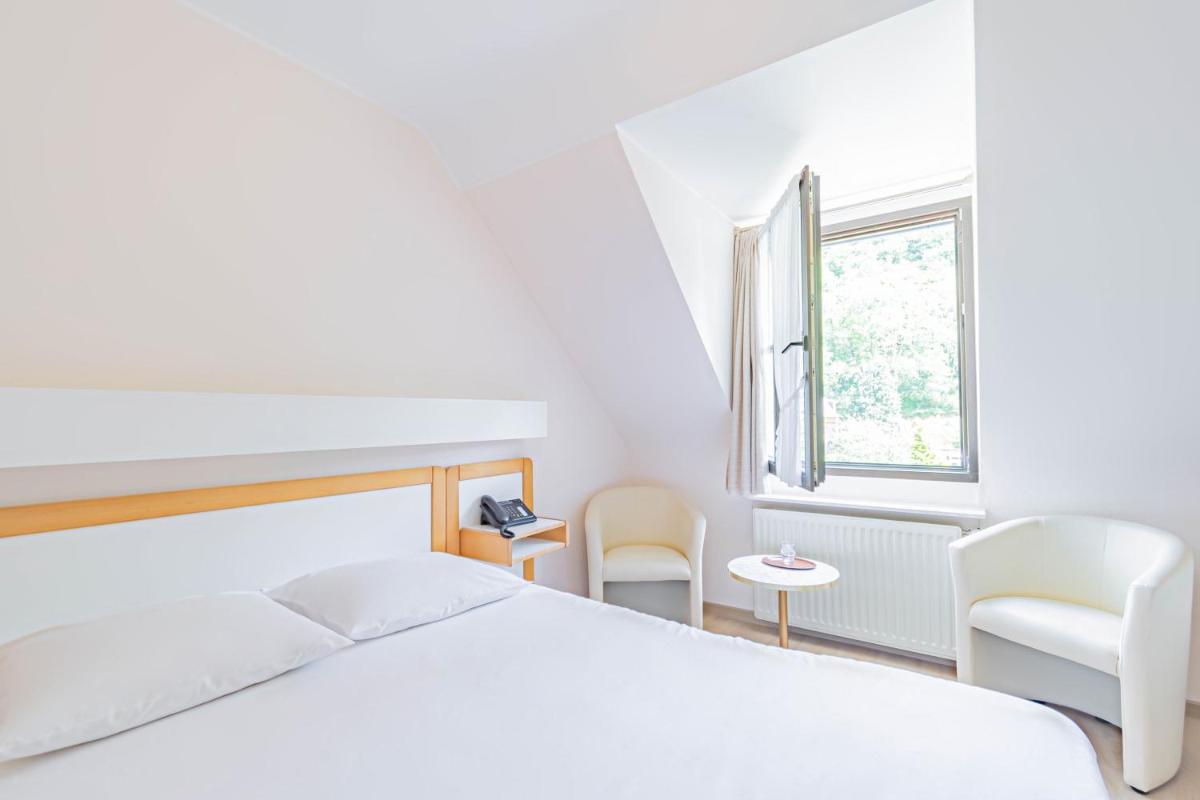 Hotel Le Postillon - Housity