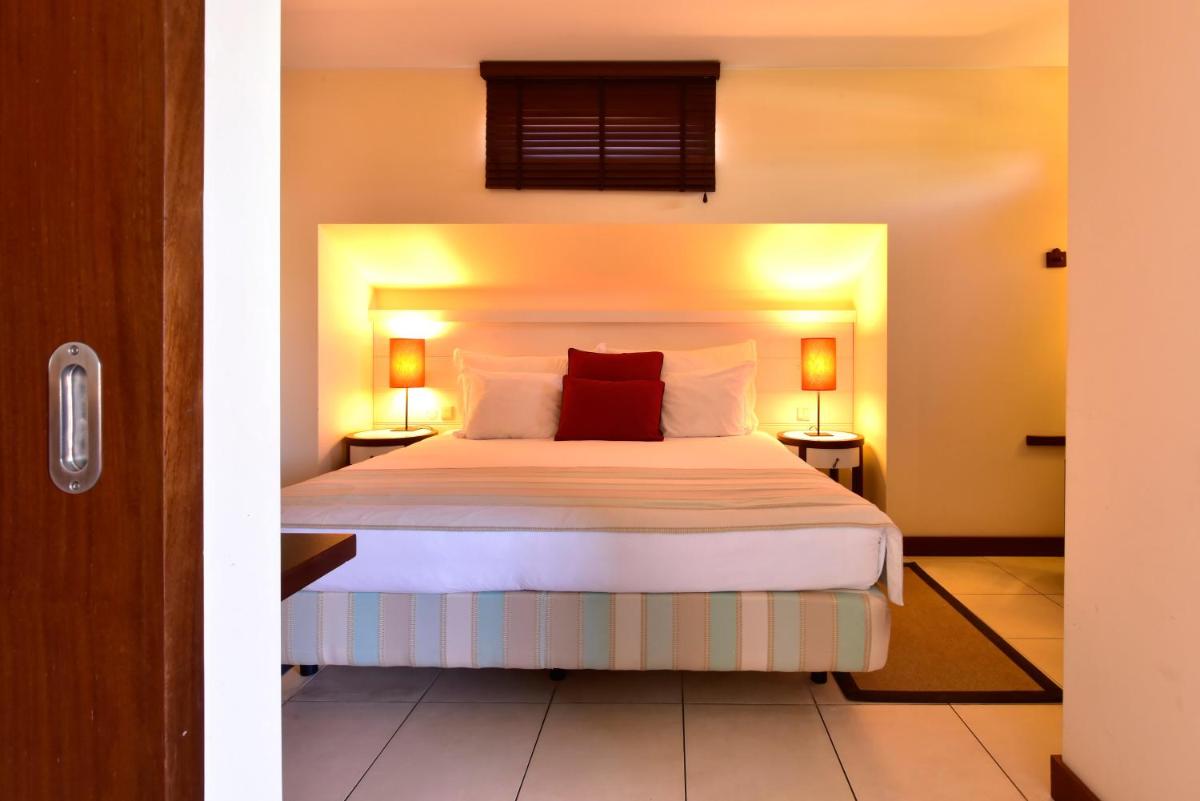 Uma cama ou camas num quarto em Pestana Porto Santo Premium All Inclusive Beach & SPA Resort