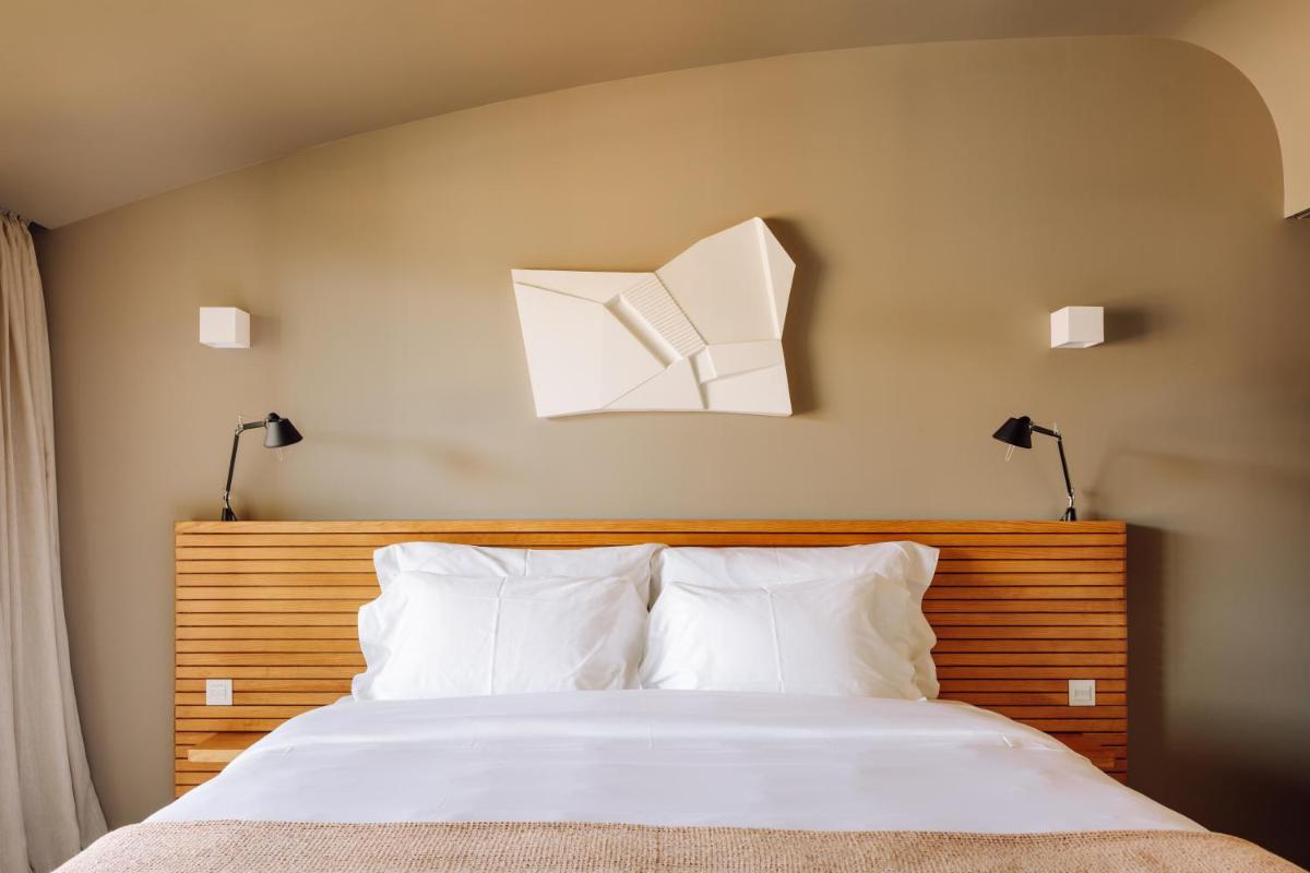 Uma cama ou camas num quarto em Immerso Hotel, a Member of Design Hotels