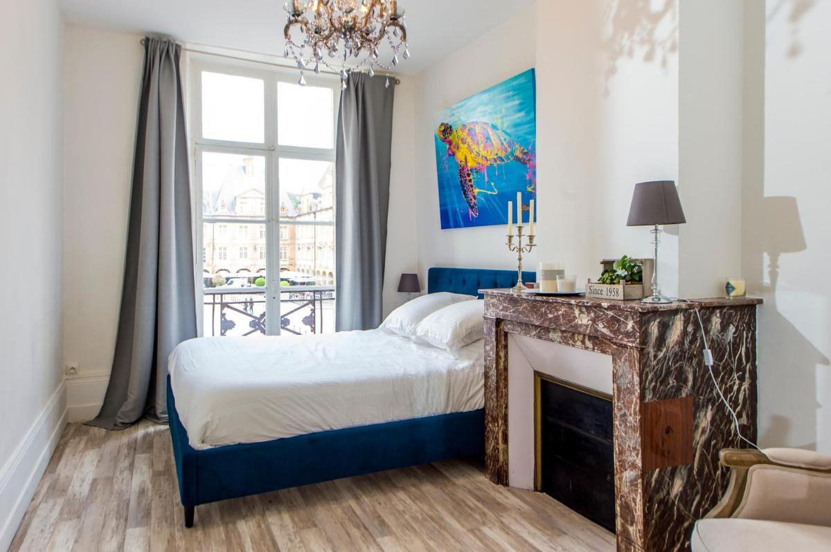Suites Mana - Suite Bleu Pacifique - Place Ducale avec Parking privé inclus - Housity