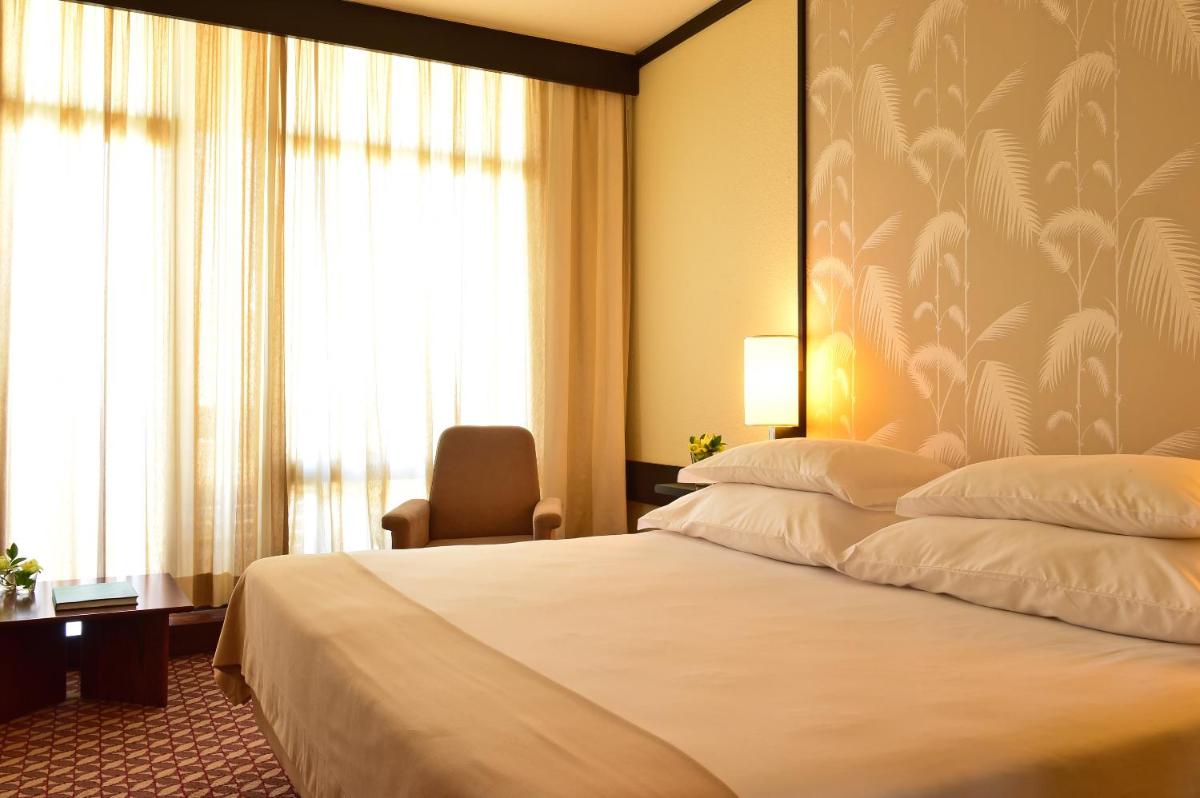 Uma cama ou camas num quarto em Pestana Casino Park Hotel & Casino