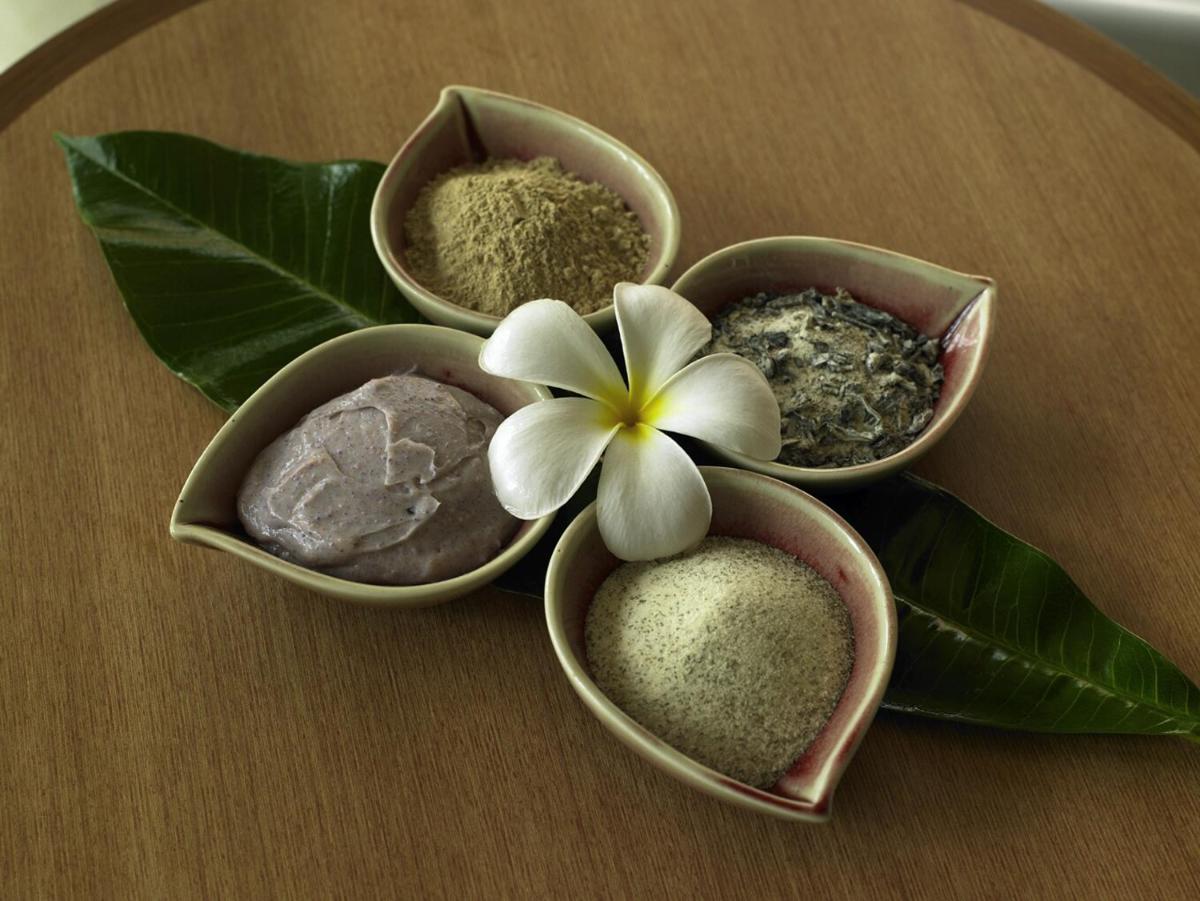 four bowls filled with different types of spices on a table at Novotel Kolkata Hotel and Residences in Kolkata four bowls filled with different types of spices on a table at Novotel Kolkata Hotel and Residences in Kolkata