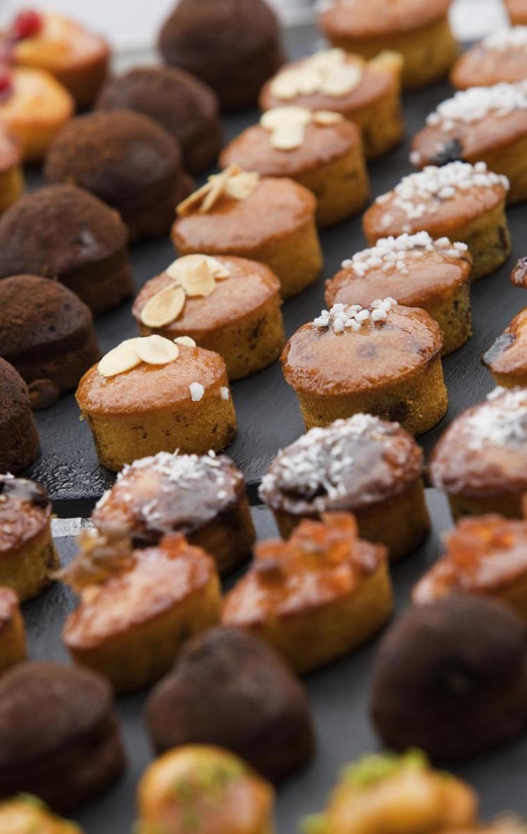 a bunch of cupcakes on a baking sheet at Novotel Kolkata Hotel and Residences in Kolkata a bunch of cupcakes on a baking sheet at Novotel Kolkata Hotel and Residences in Kolkata