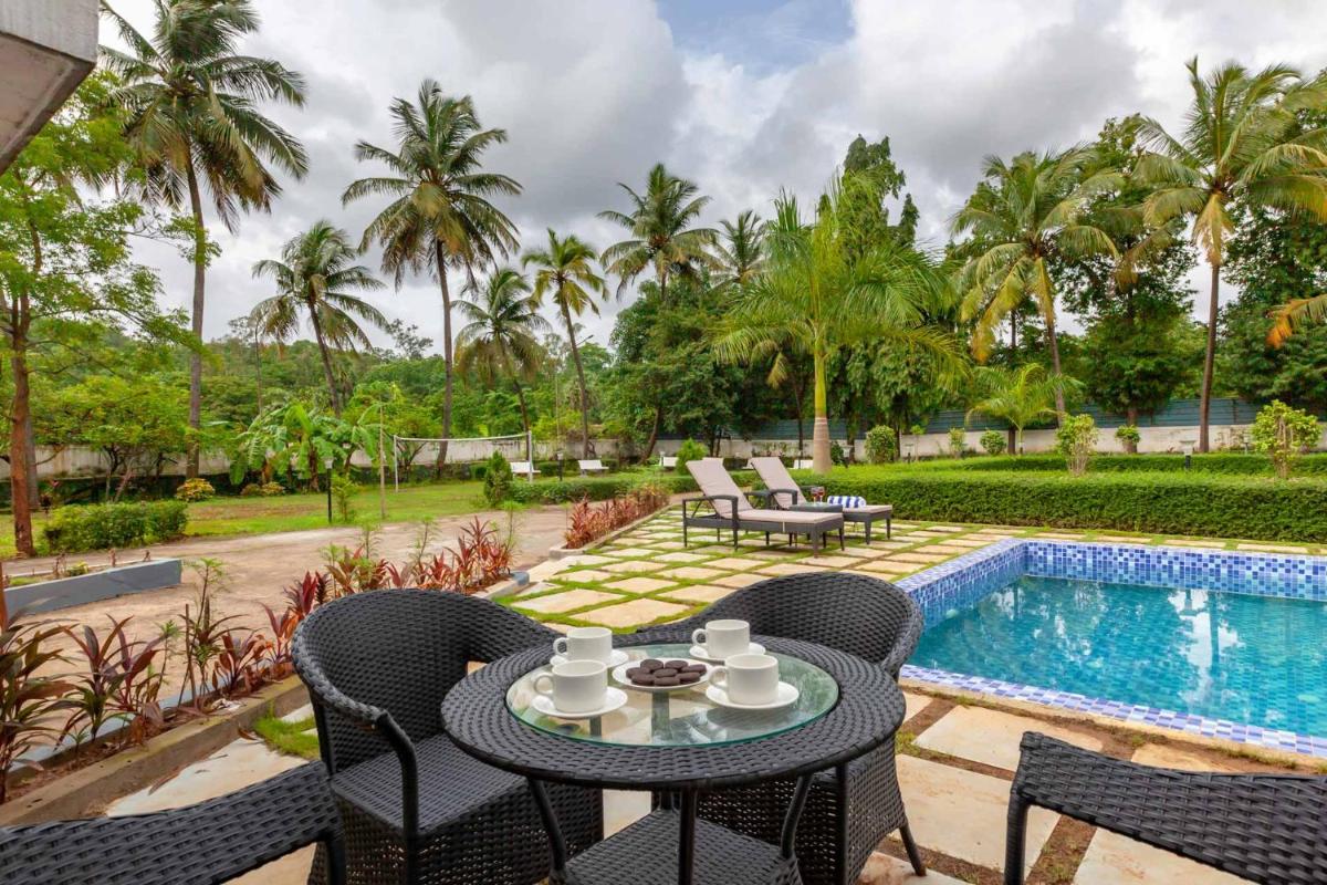 Suitetrails - Grey Mosaics by StayVista - Mountain-view villa in Vasai with Pool, Spacious lawn & Terrace