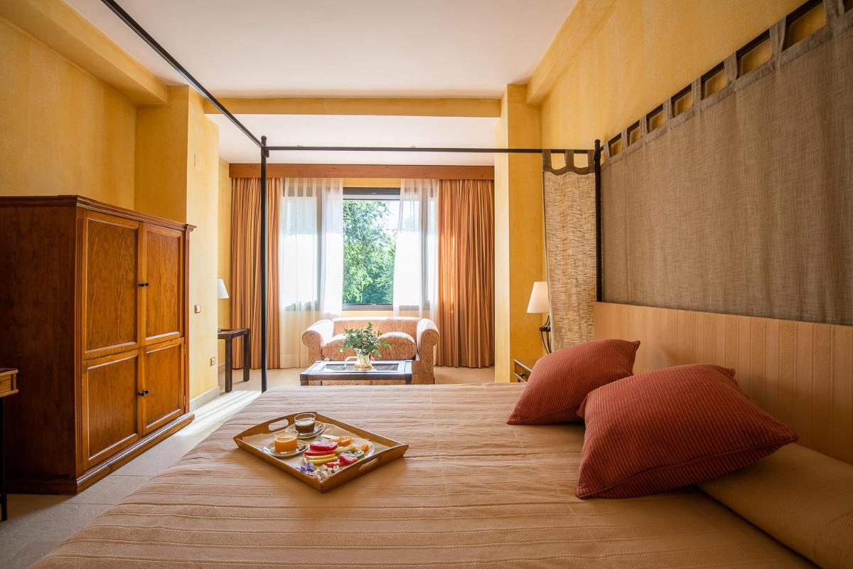 Cama o camas de una habitación en Intelier Airén