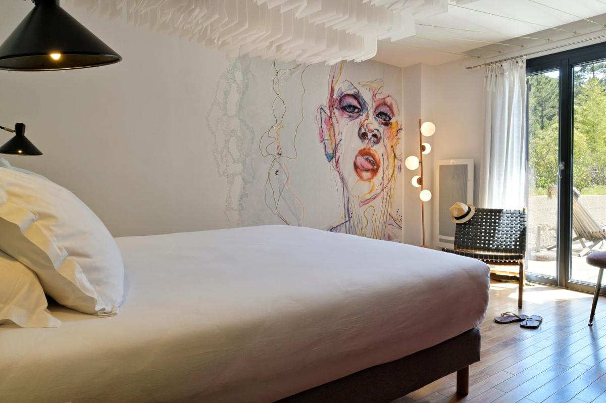 Un ou plusieurs lits dans un hébergement de l'établissement Hotel E Caselle - Demeures & Châteaux