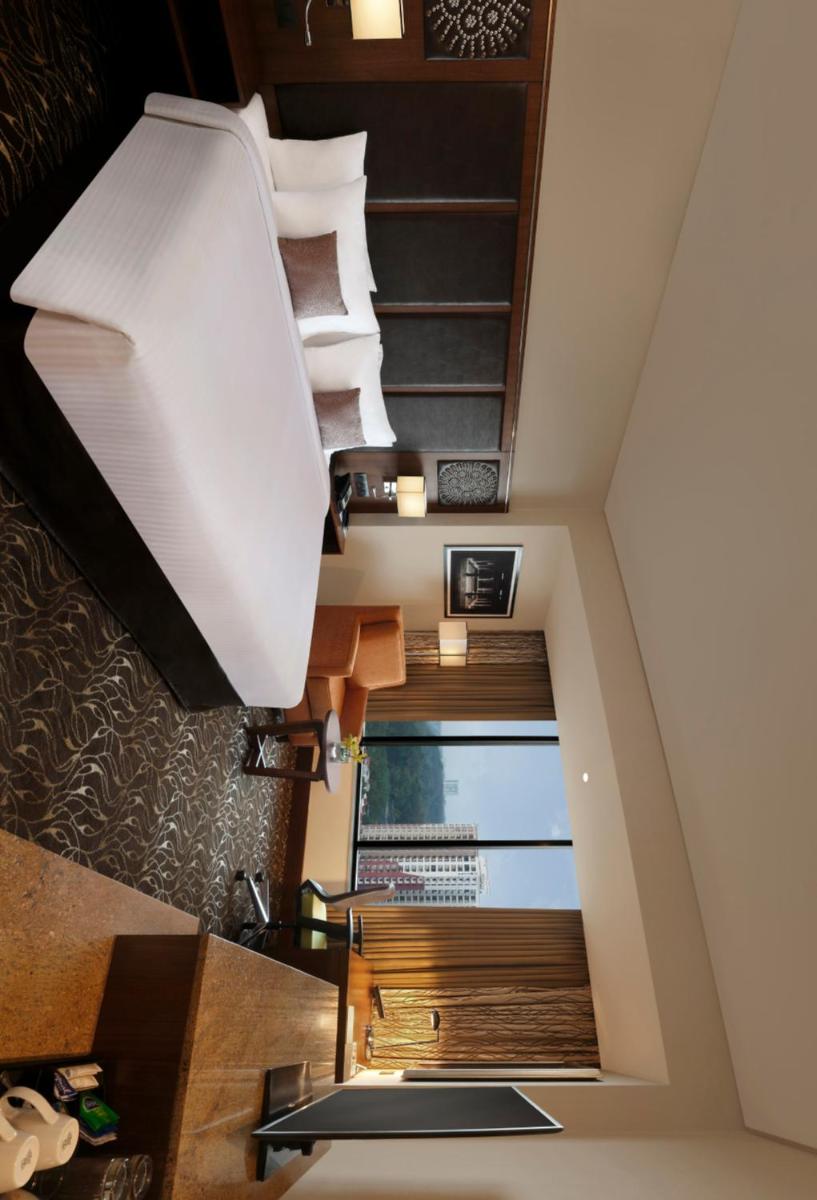 an overhead view of a room with a staircase and a window at Novotel Kochi Infopark in Cochin