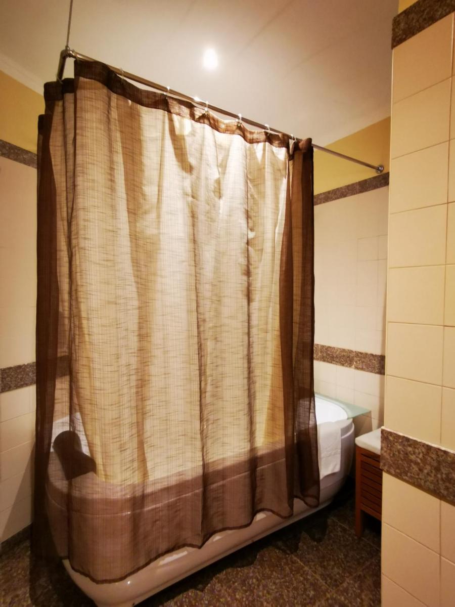 Uma cama ou camas num quarto em Hotel Da Montanha