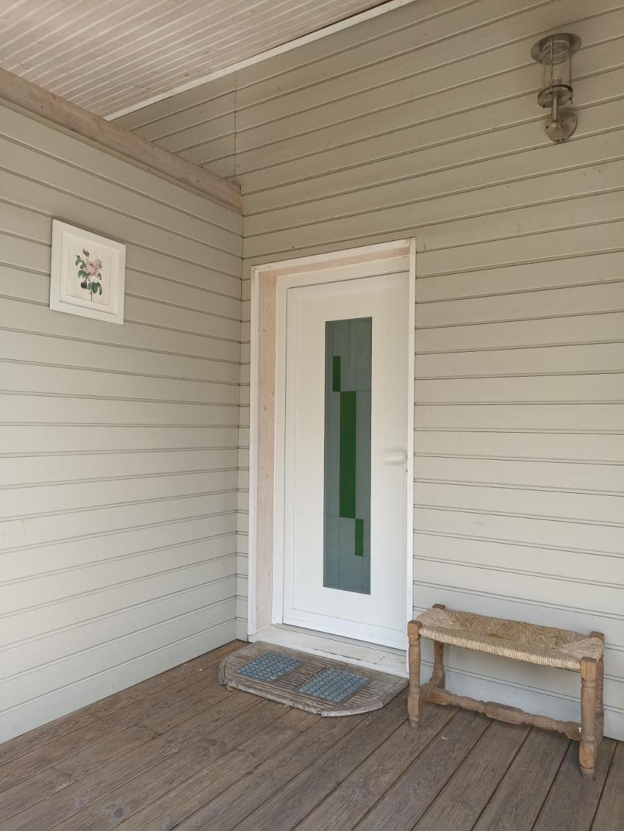 Suite parentale dans maison en bois Carcans - vue jardin - Housity