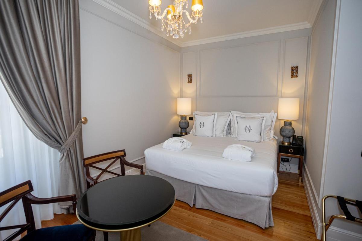 Uma cama ou camas num quarto em Solar do Requeijo by Luna Hotels & Resorts
