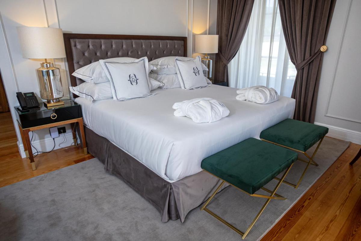 Uma cama ou camas num quarto em Solar do Requeijo by Luna Hotels & Resorts
