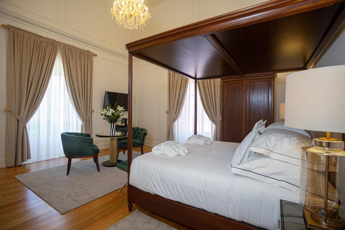 Uma cama ou camas num quarto em Solar do Requeijo by Luna Hotels & Resorts