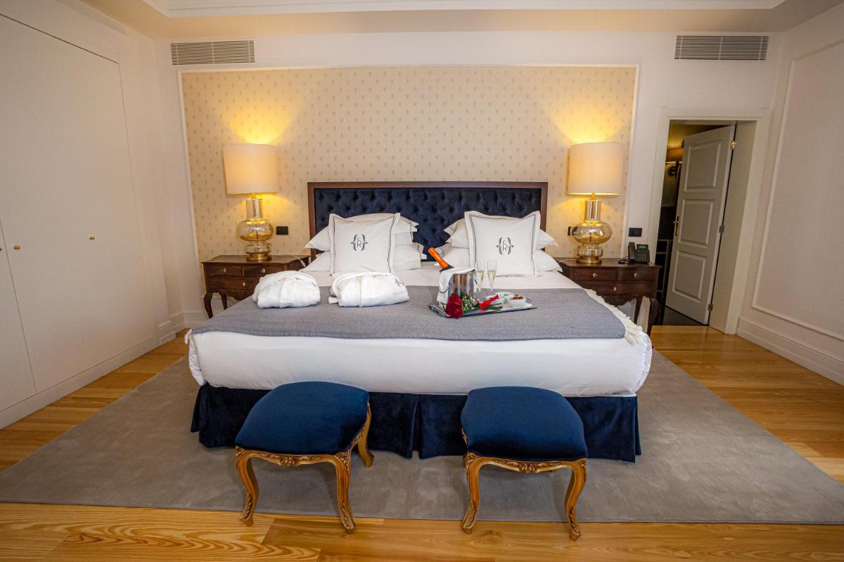 Uma cama ou camas num quarto em Solar do Requeijo by Luna Hotels & Resorts