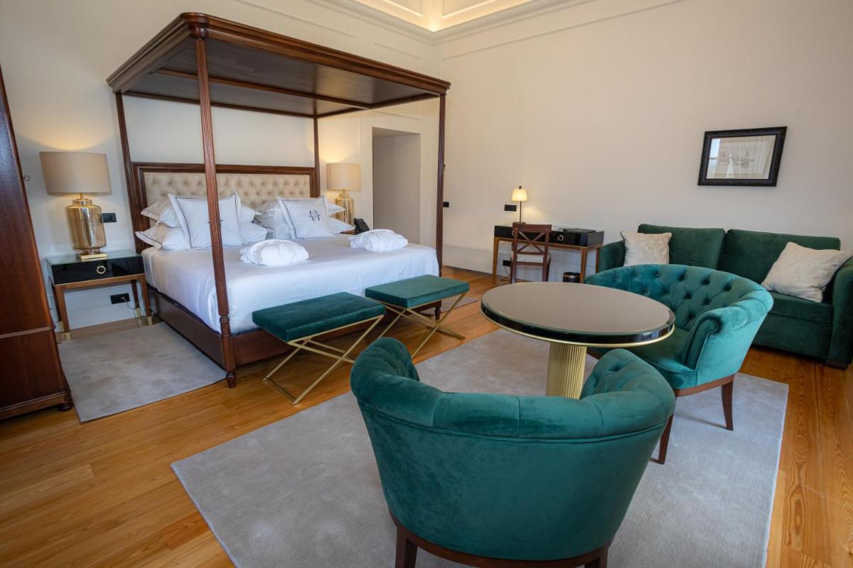 Uma cama ou camas num quarto em Solar do Requeijo by Luna Hotels & Resorts