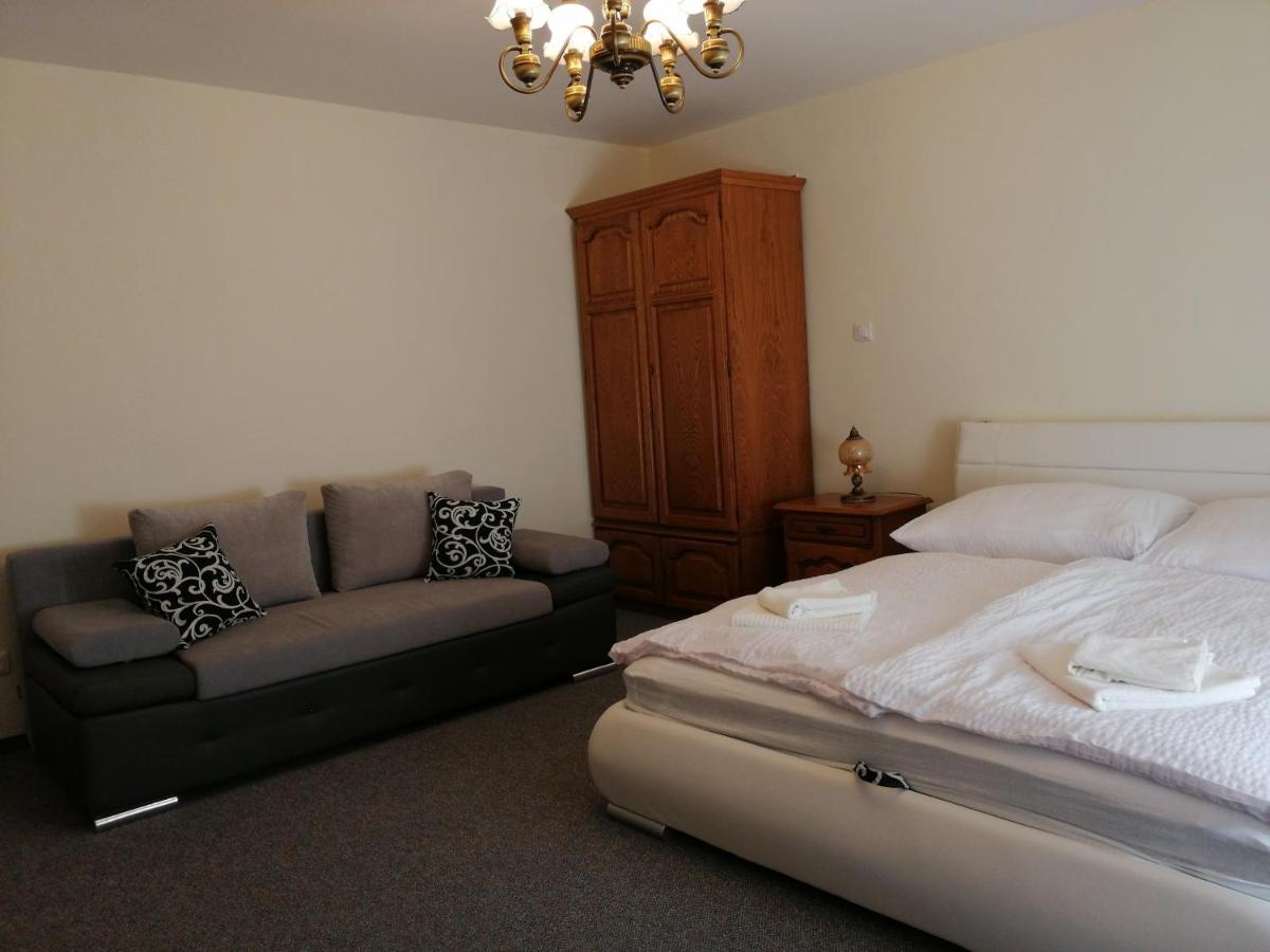 Flóra Apartmanok - Housity