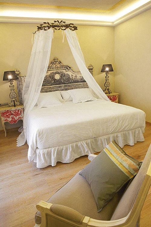 Cama o camas de una habitación en Hotel Sa Calma
