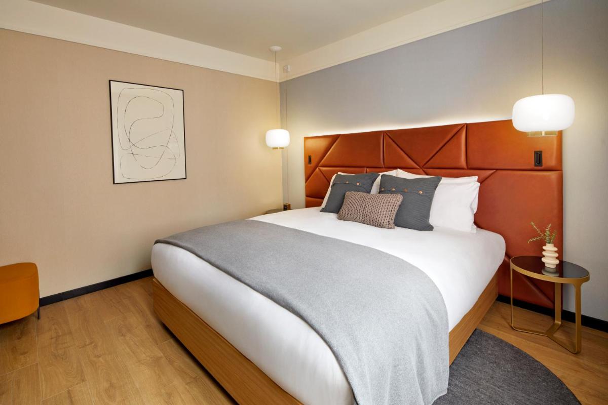 Cama o camas de una habitación en Kimpton Vividora Hotel by IHG