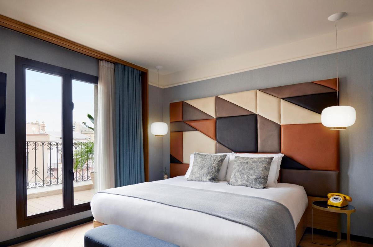 Cama o camas de una habitación en Kimpton Vividora Hotel by IHG