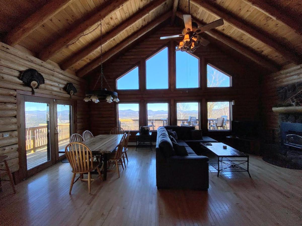 SI INCREDIBLE VIEWS from this log cabin with large deck huge yard fire pit hot tub - Housity